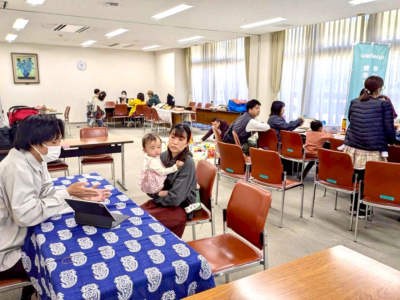 welleap地域イベント — 保護者と専門家の個別相談の様子